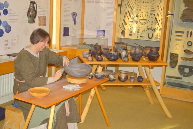 Hands on learning - Ymma with some of the results from our Anglo-Saxon Pottery Workshops. | &copy;E.Haynes 2017